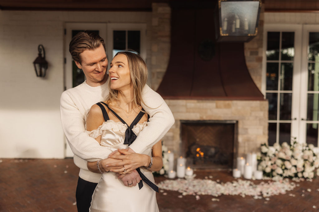 Intimate outdoor embrace under warm sunset light at a Rosewood Miramar proposal
