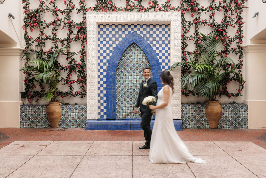 Creative portrait session by Santa Barbara wedding photographer around the Kimpton Canary valet fountain.